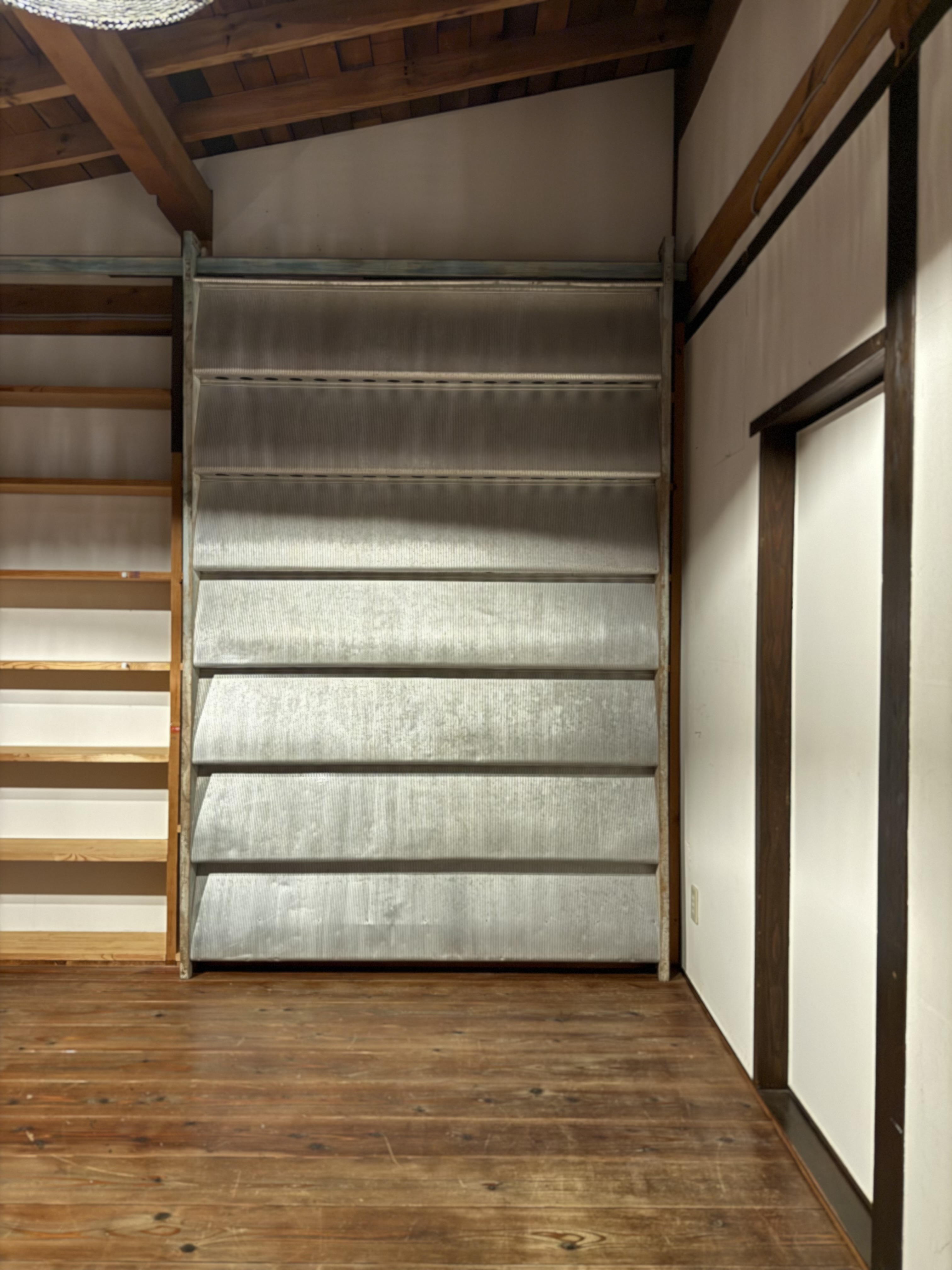 Jean Prouvé Brise-Soleil (sun shutter) — frontal view, corrugated aluminium louvres