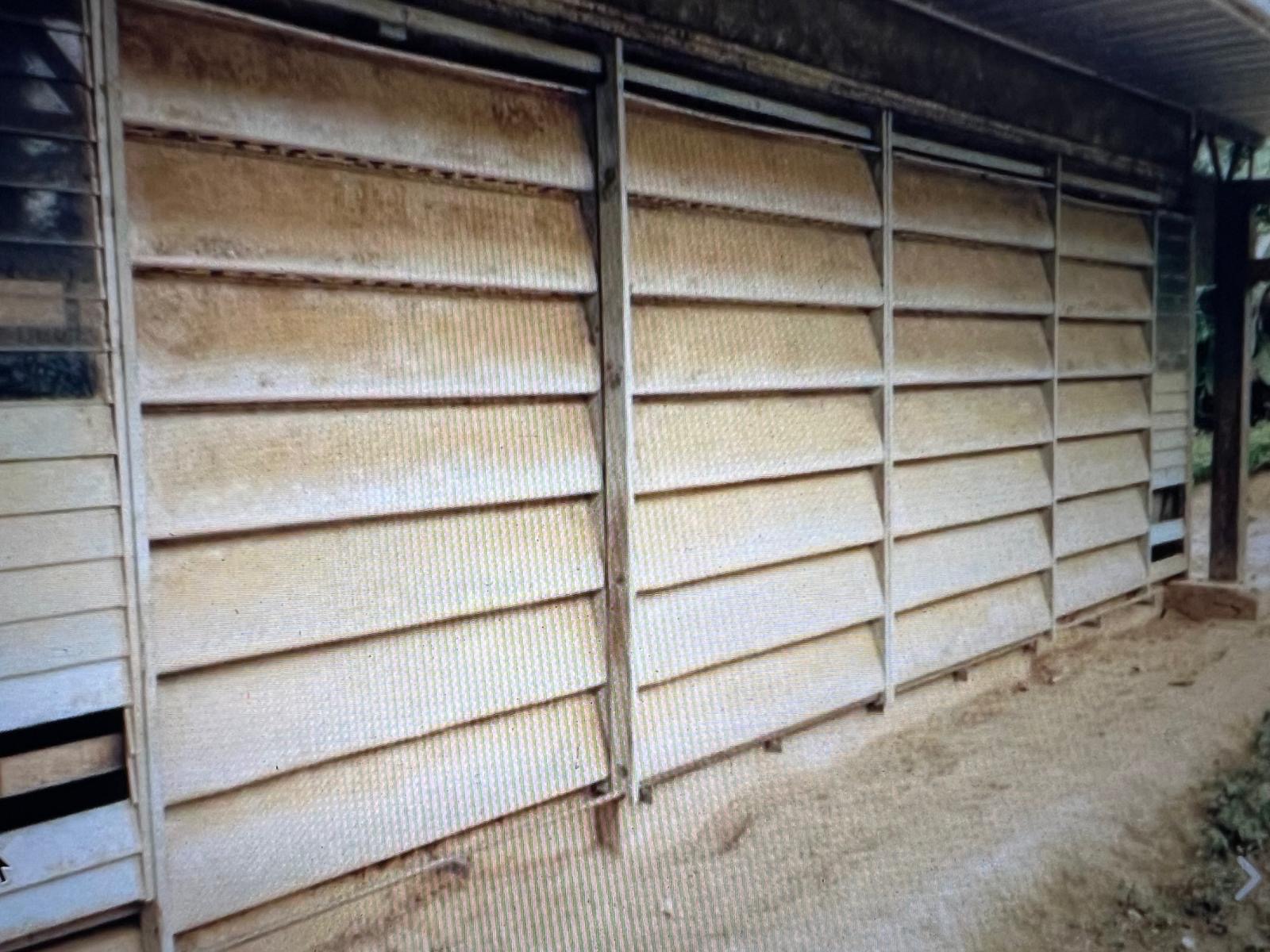 Jean Prouvé brise-soleil panels installed on school facade, Cameroon